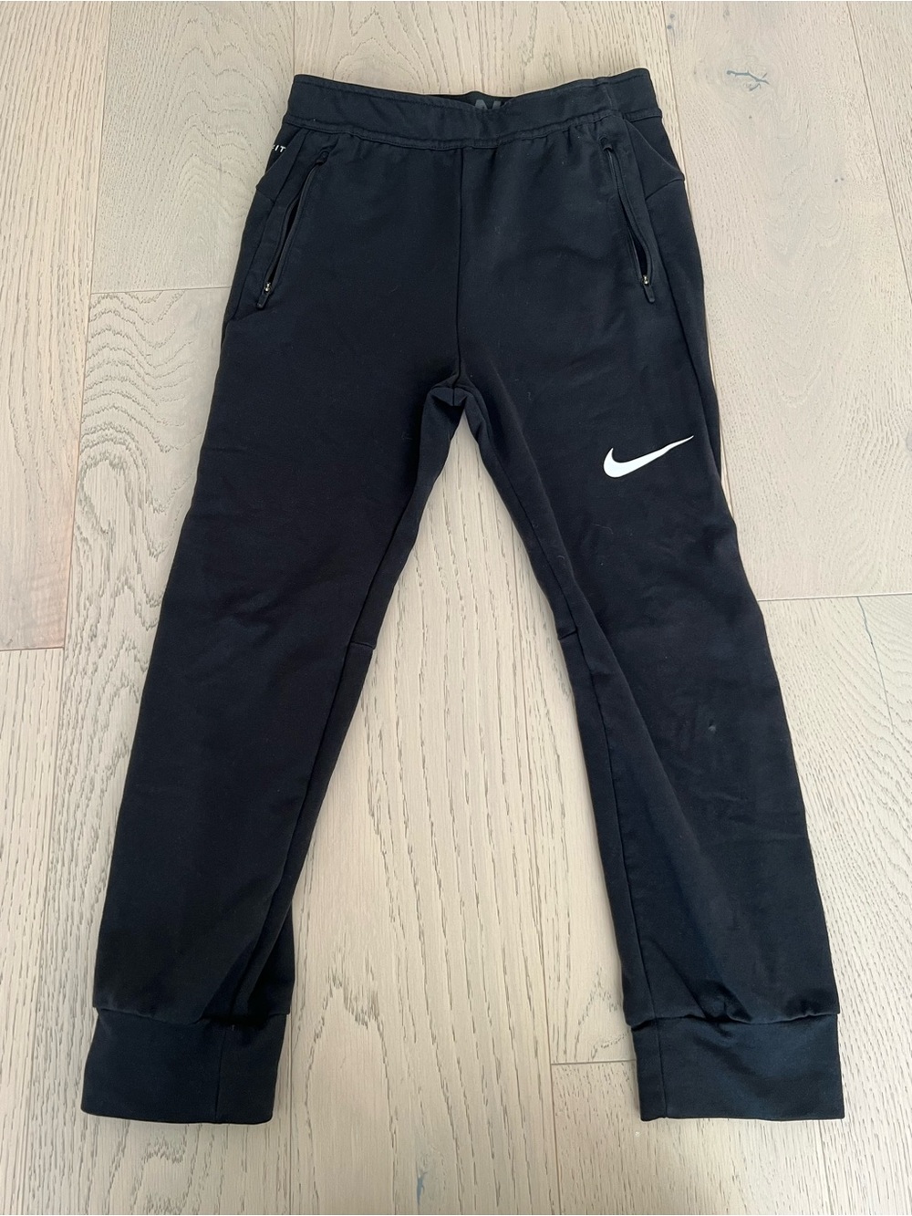 Nike Black Kids Zip-Pocket Joggers with White Swoosh - Picture 1 of 4